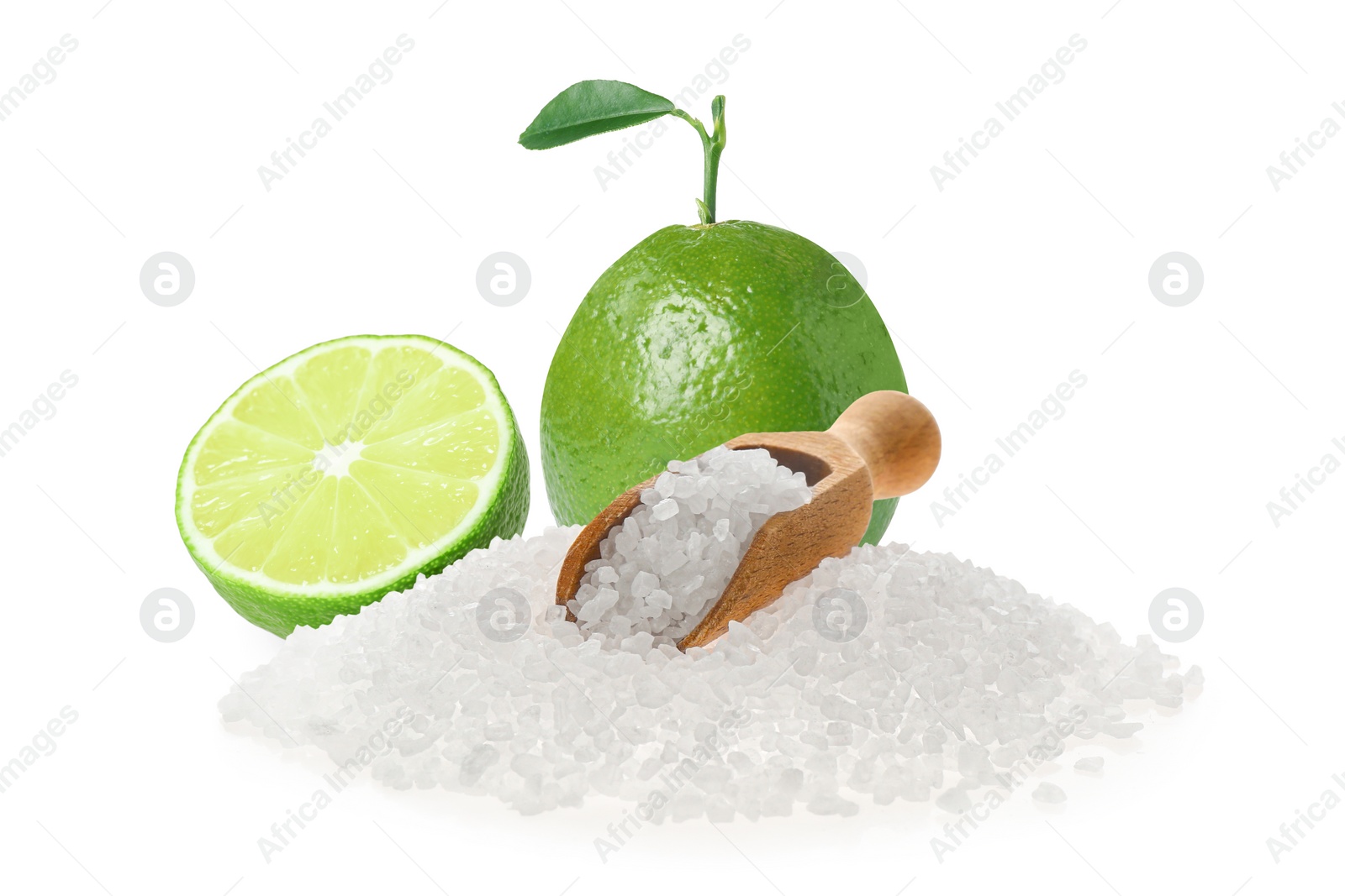 Image of Limes and salt isolated on white. Margarita cocktail ingredients