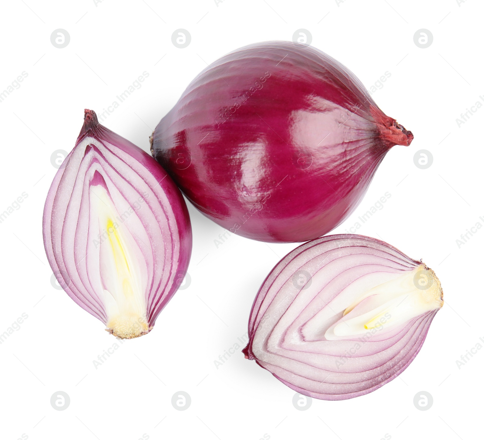 Photo of Fresh whole and cut red onions on white background, top view