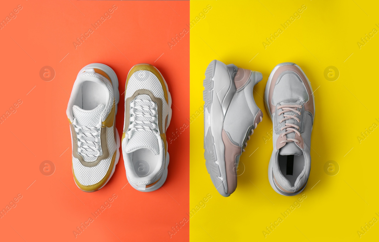 Photo of Flat lay composition of woman training shoes on color background