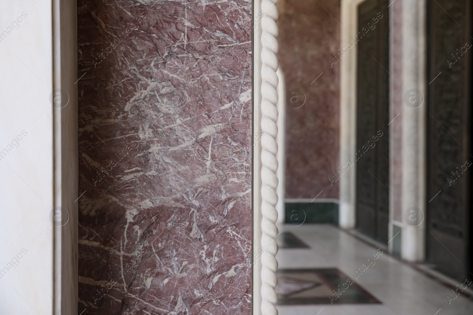 Photo of Closeup view of beautiful wall of building indoors. Space for text