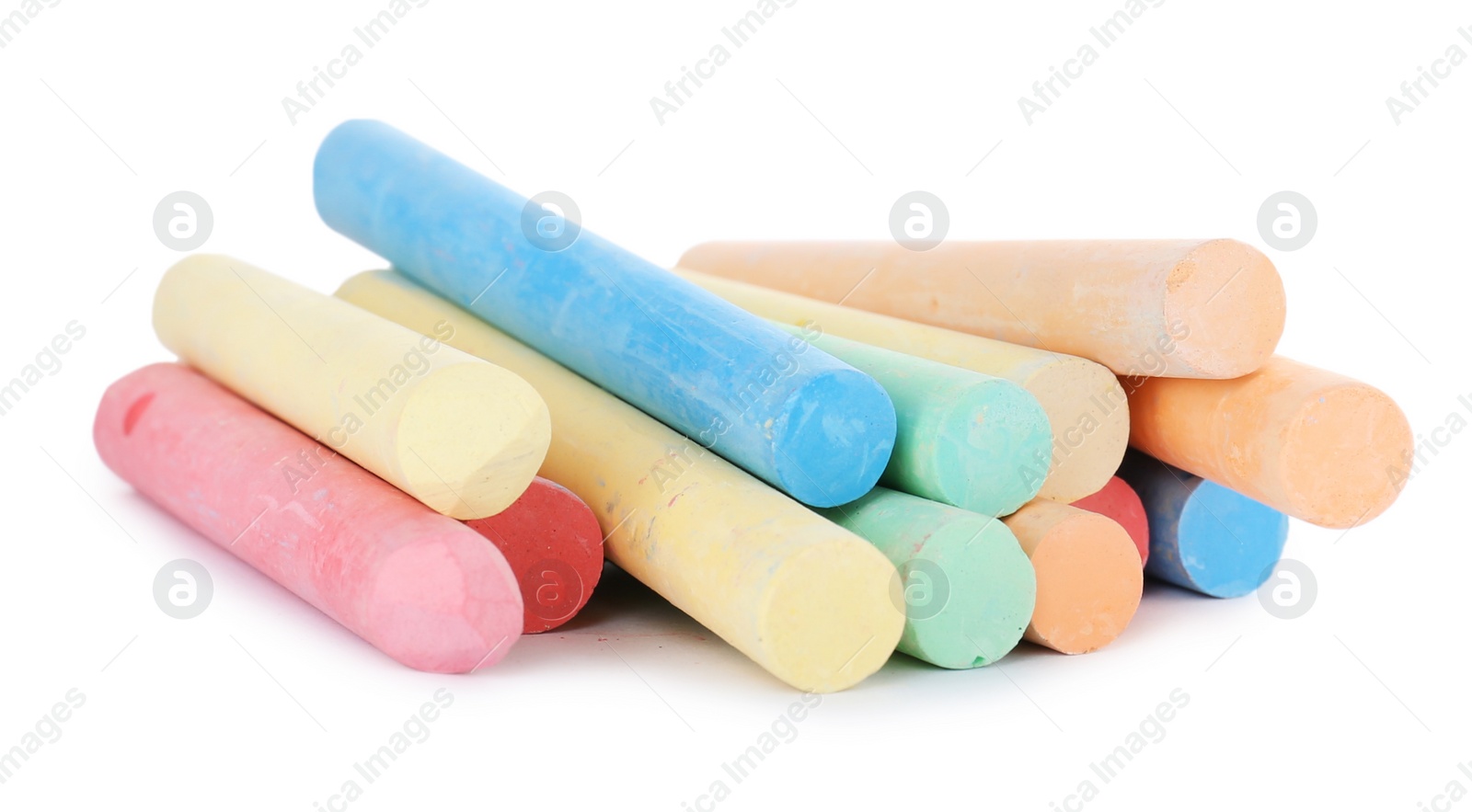 Photo of Color pieces of chalk on white background