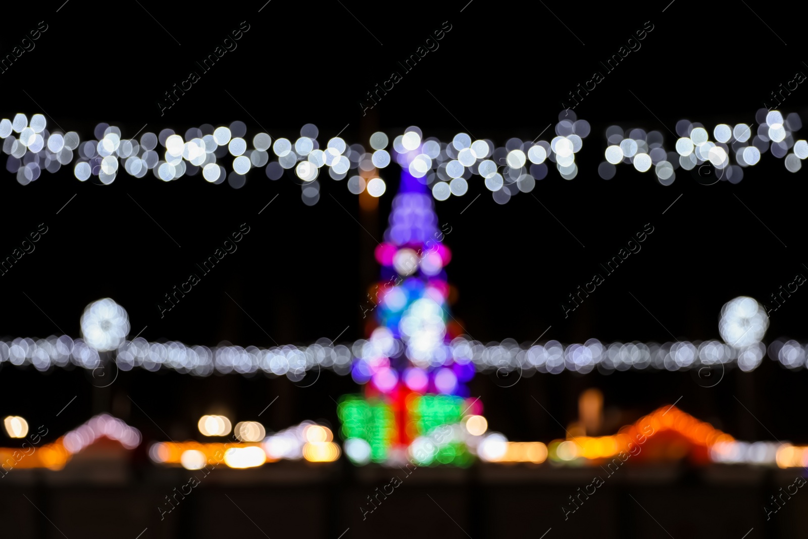 Photo of Beautiful street lights at night. Bokeh effect