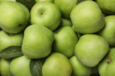 Photo of Fresh green apples as background, top view