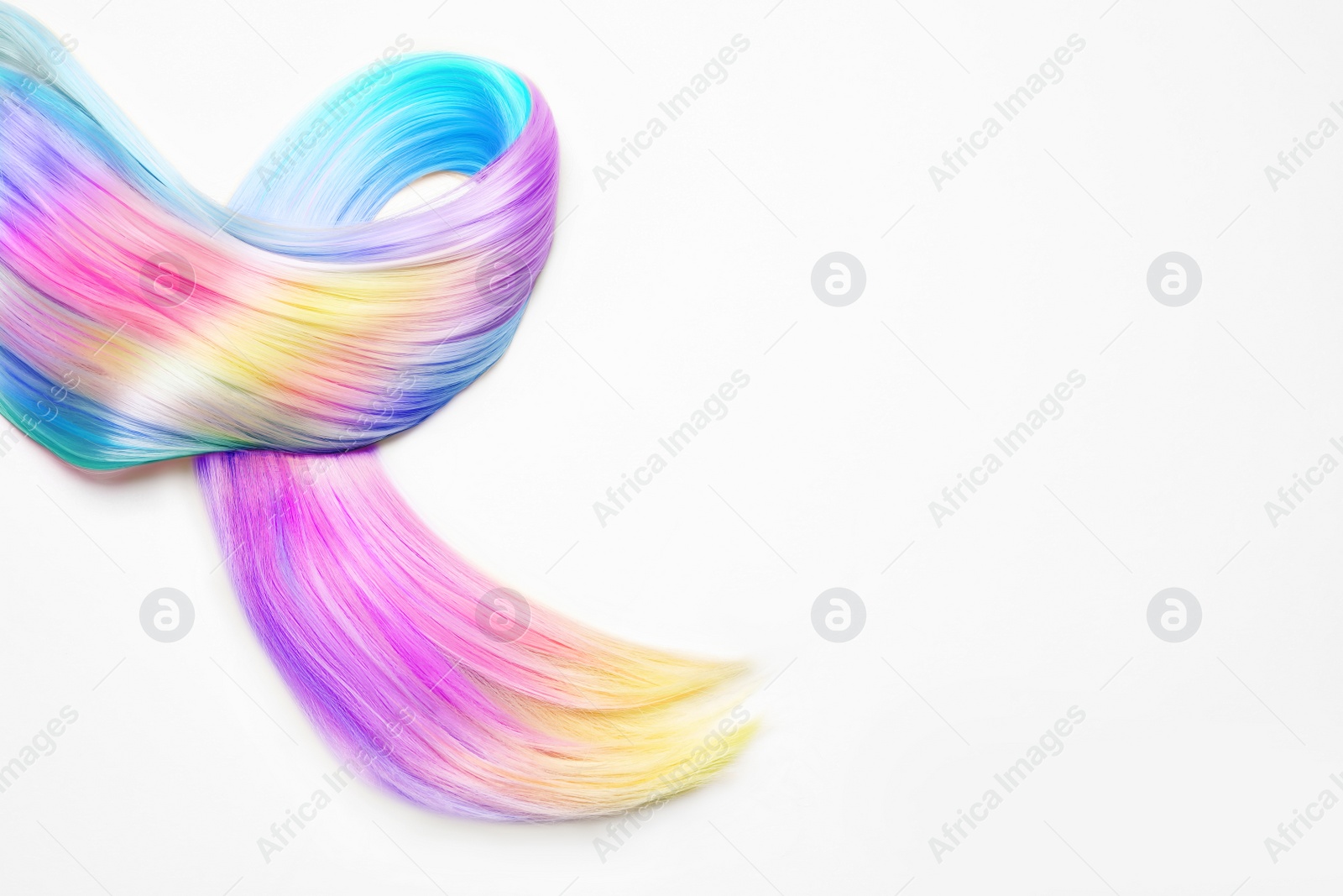 Image of Strand of beautiful multicolored hair on white background, top view