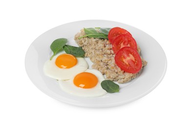 Photo of Delicious boiled oatmeal with fried eggs, tomato and basil isolated on white