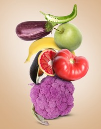 Image of Stack of different vegetables and fruits on beige background