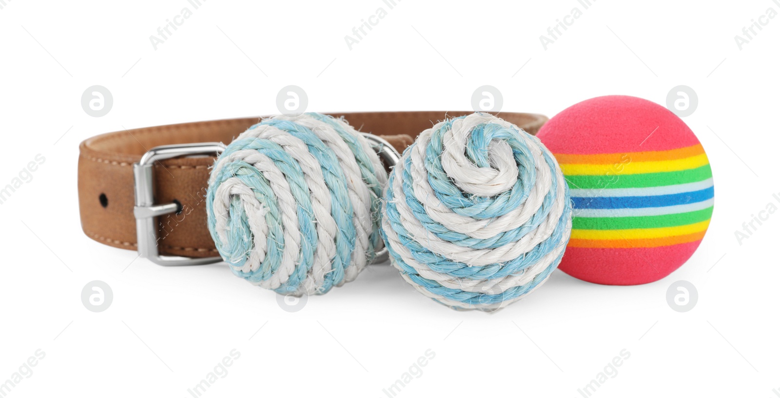 Photo of Toy balls and pet collar isolated on white