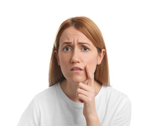 Upset woman suffering from herpes on white background