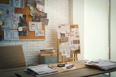 Modern detective office with workplace and board
