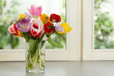 Photo of Beautiful spring flowers on window sill indoors