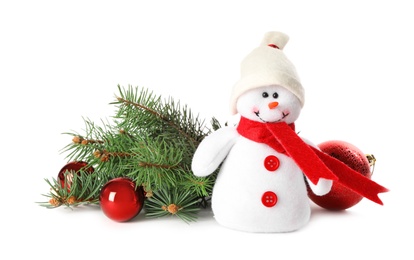 Cute snowman toy, fir tree and red Christmas balls on white background