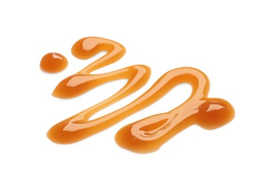 Photo of Stroke of sweet caramel sauce isolated on white