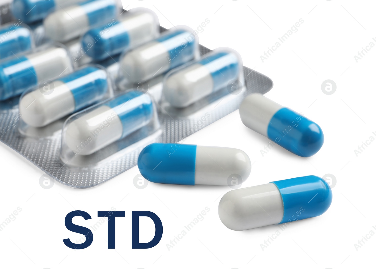 Image of Blister with pills and abbreviation STD on white background, closeup