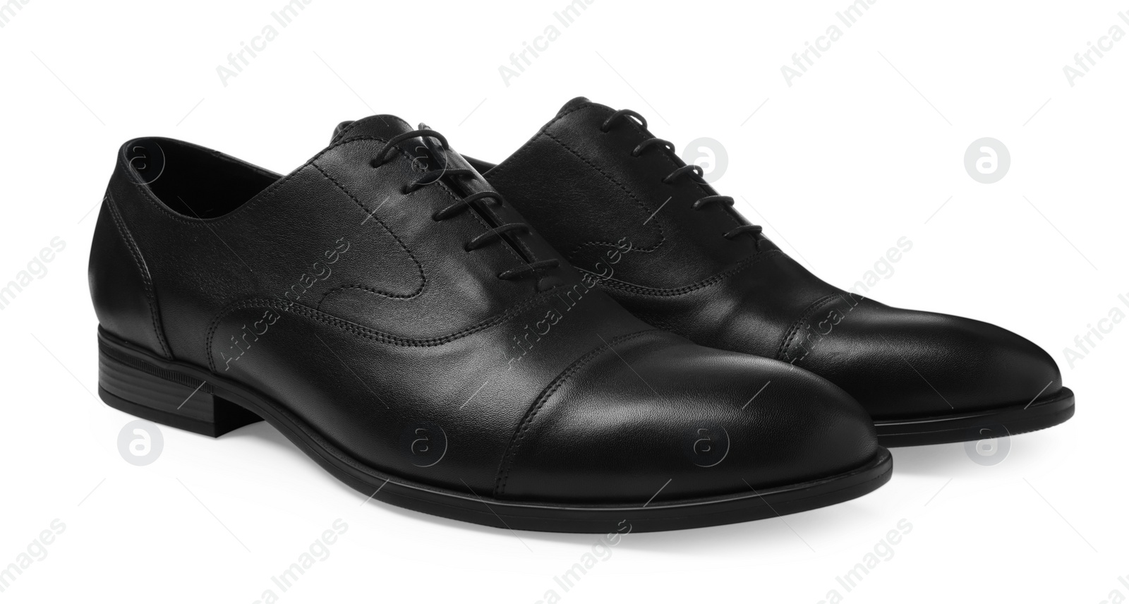 Photo of Pair of black leather men shoes isolated on white