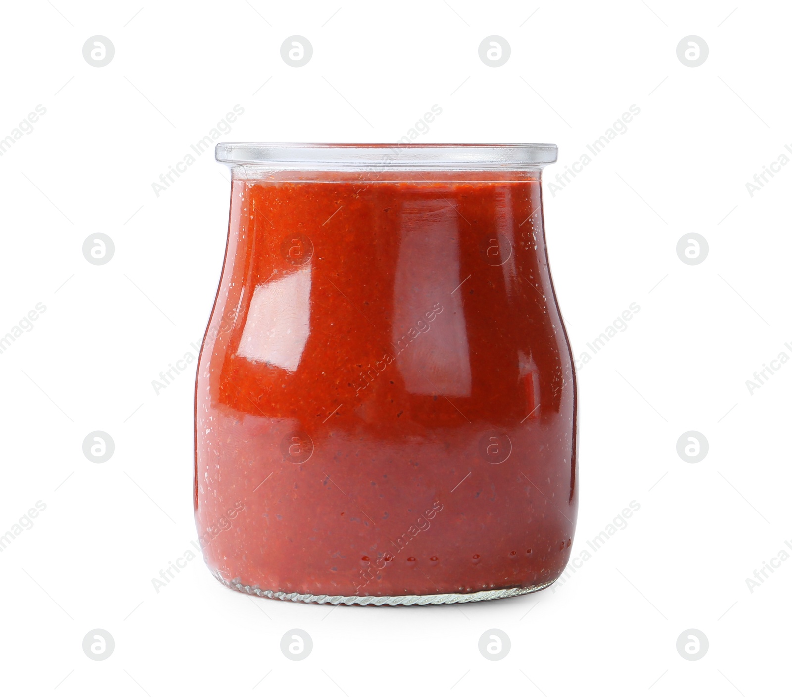 Photo of Red curry paste in glass jar isolated on white