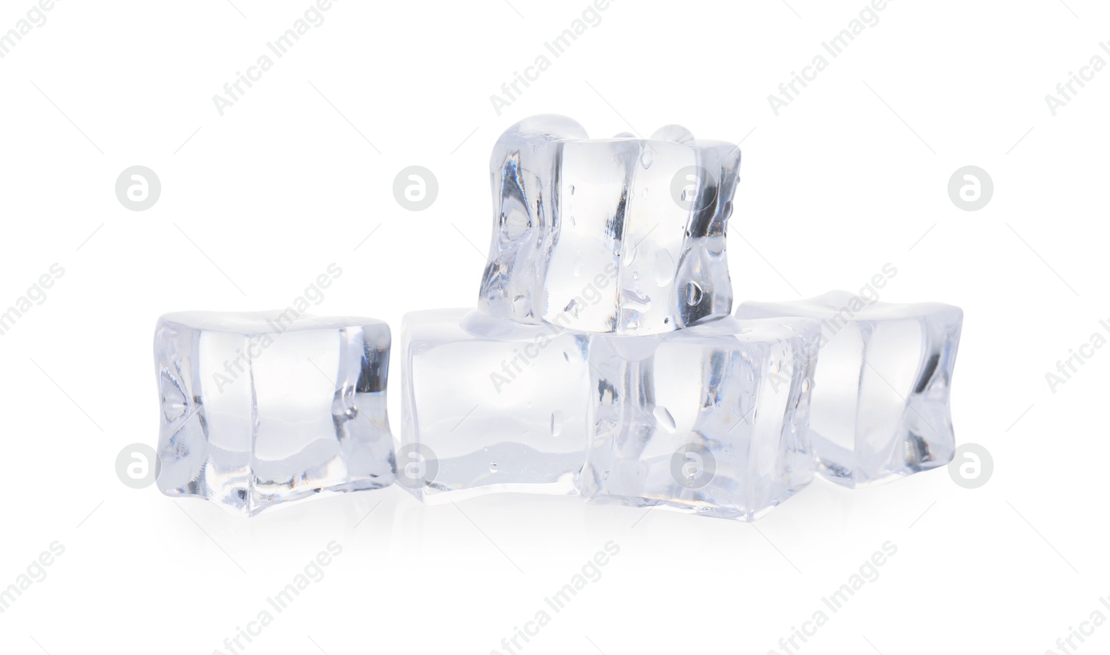 Photo of Many melting crystal clear ice cubes isolated on white