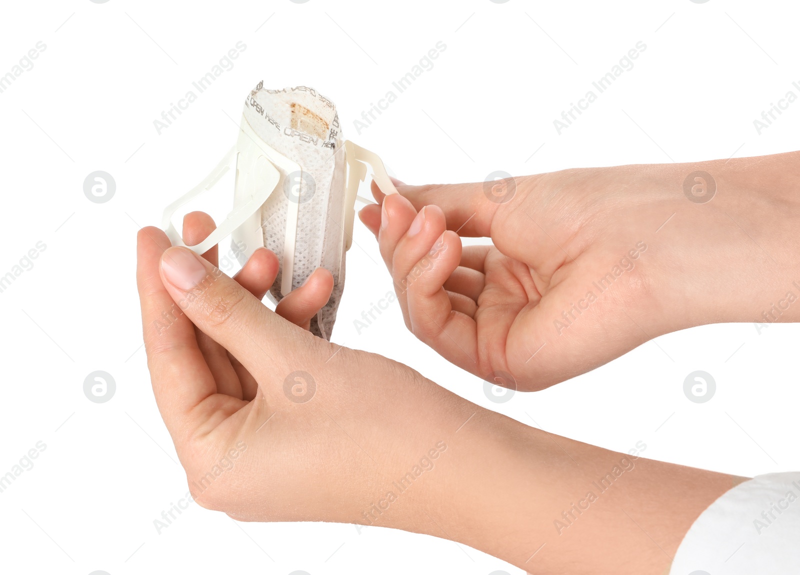 Photo of Woman opening drip coffee bag on white background, closeup