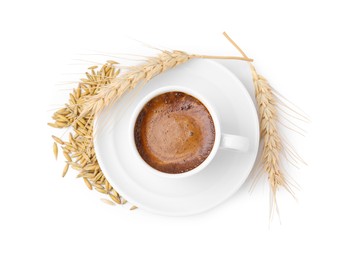 Photo of Cup of barley coffee, grains and spikes isolated on white, top view