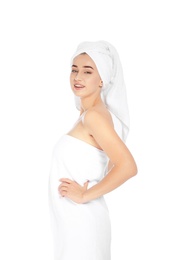 Photo of Portrait of young pretty woman with towels on white background