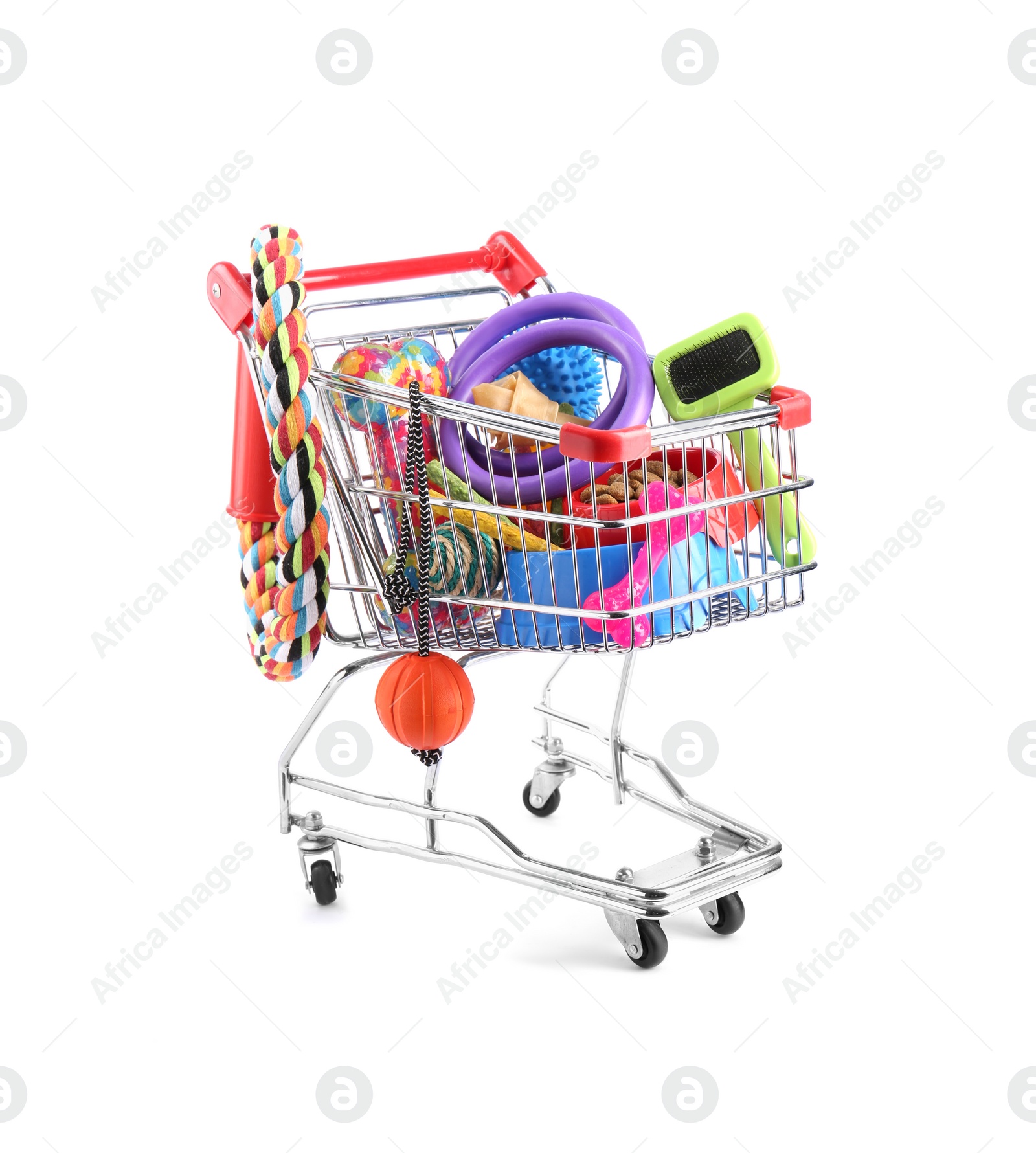 Photo of Different pet goods in shopping cart isolated on white. Shop items