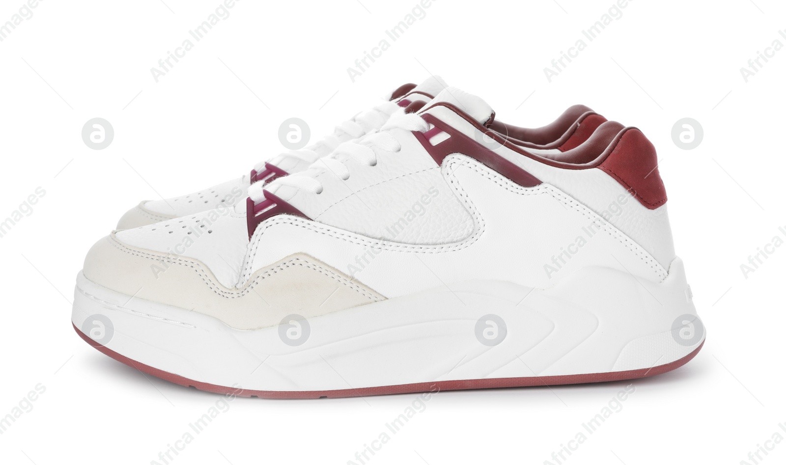 Photo of Pair of stylish shoes on white background