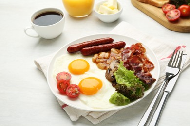 Photo of Delicious breakfast with sunny side up eggs served on white table