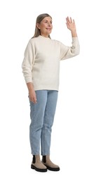 Photo of Senior woman greeting someone on white background