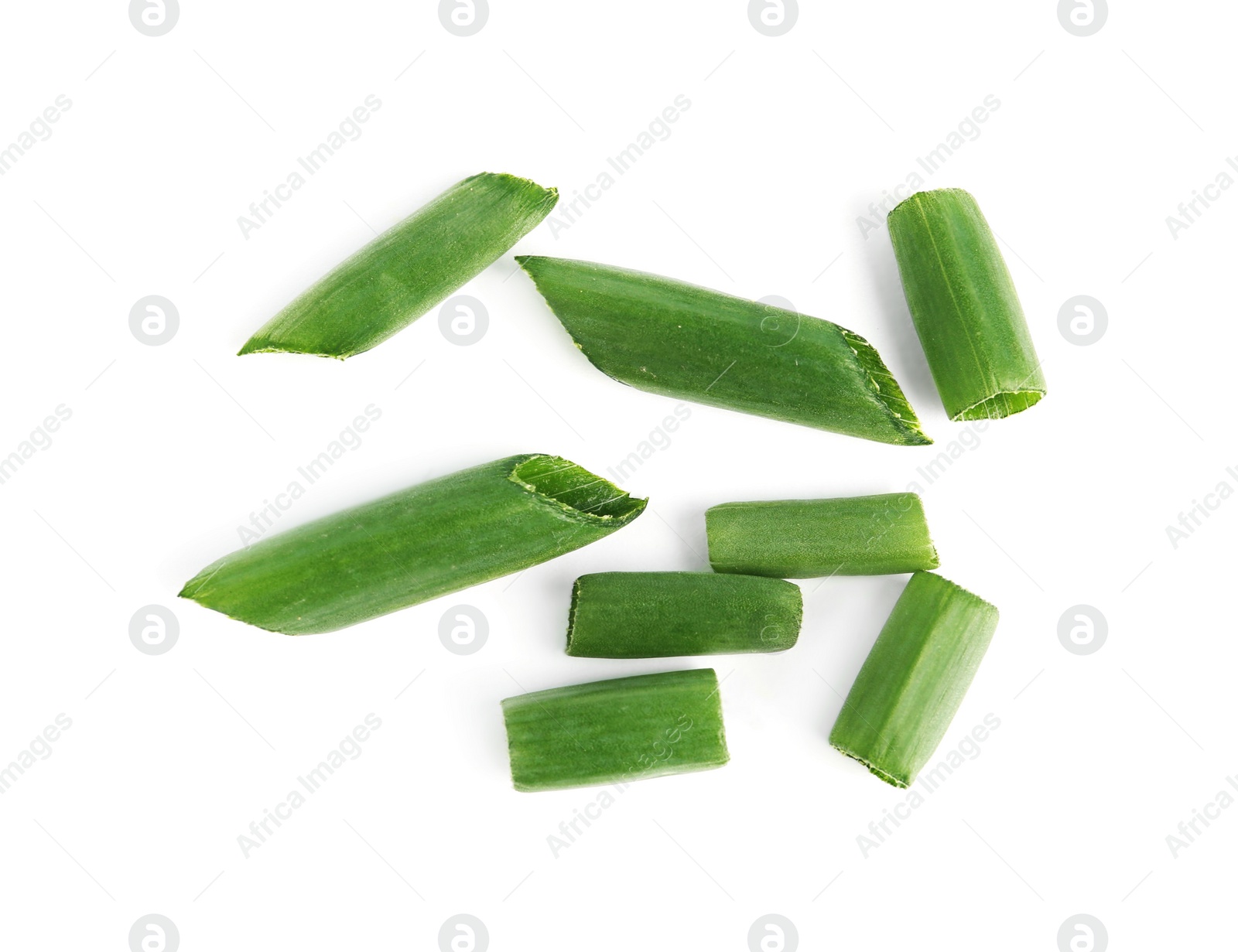 Photo of Cut green spring onion isolated on white, top view