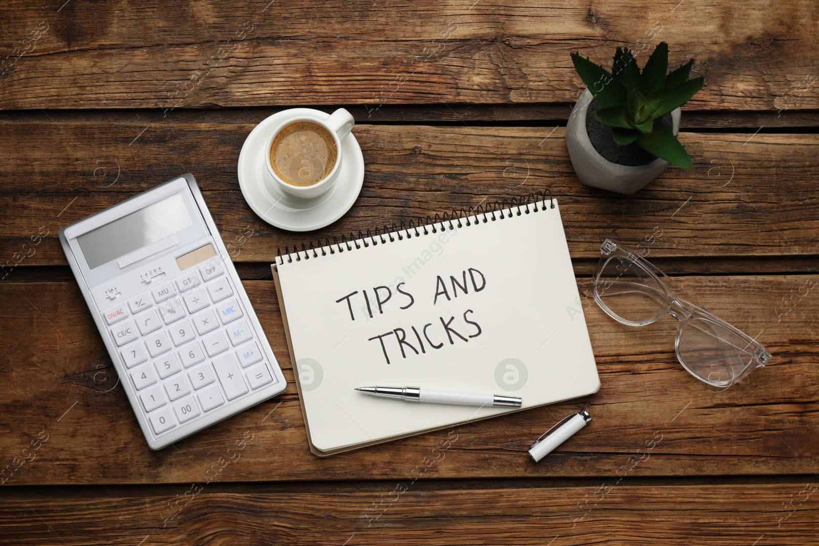 Photo of Flat lay composition with notebook on wooden table. Tips and Tricks