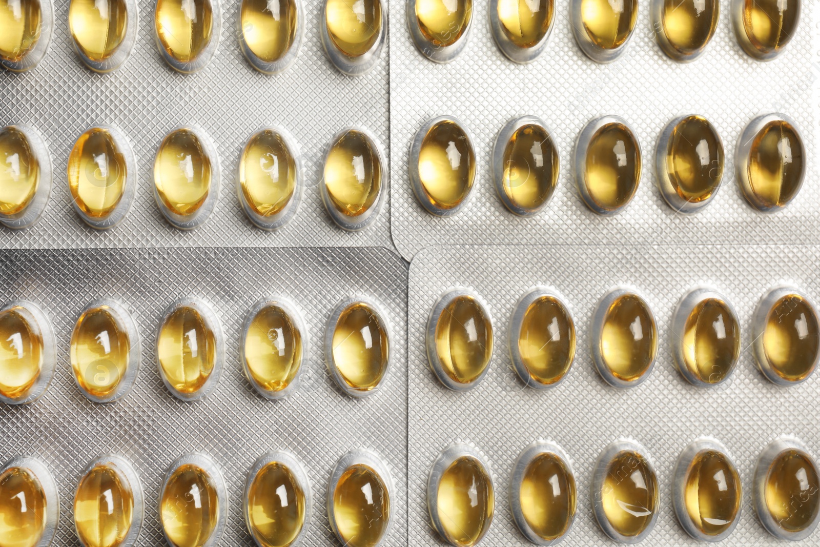 Photo of Packages with cod liver oil pills, top view