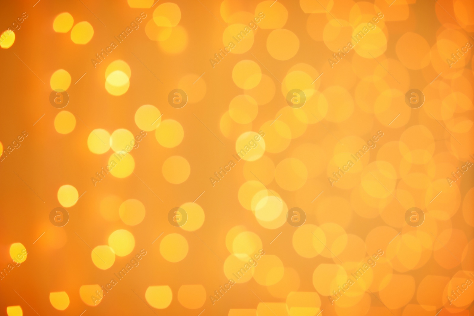 Photo of Beautiful gold lights as background. Bokeh effect