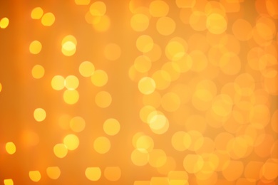 Photo of Beautiful gold lights as background. Bokeh effect