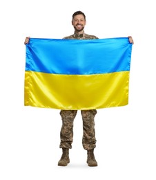 Soldier in military uniform with Ukrainian flag on white background