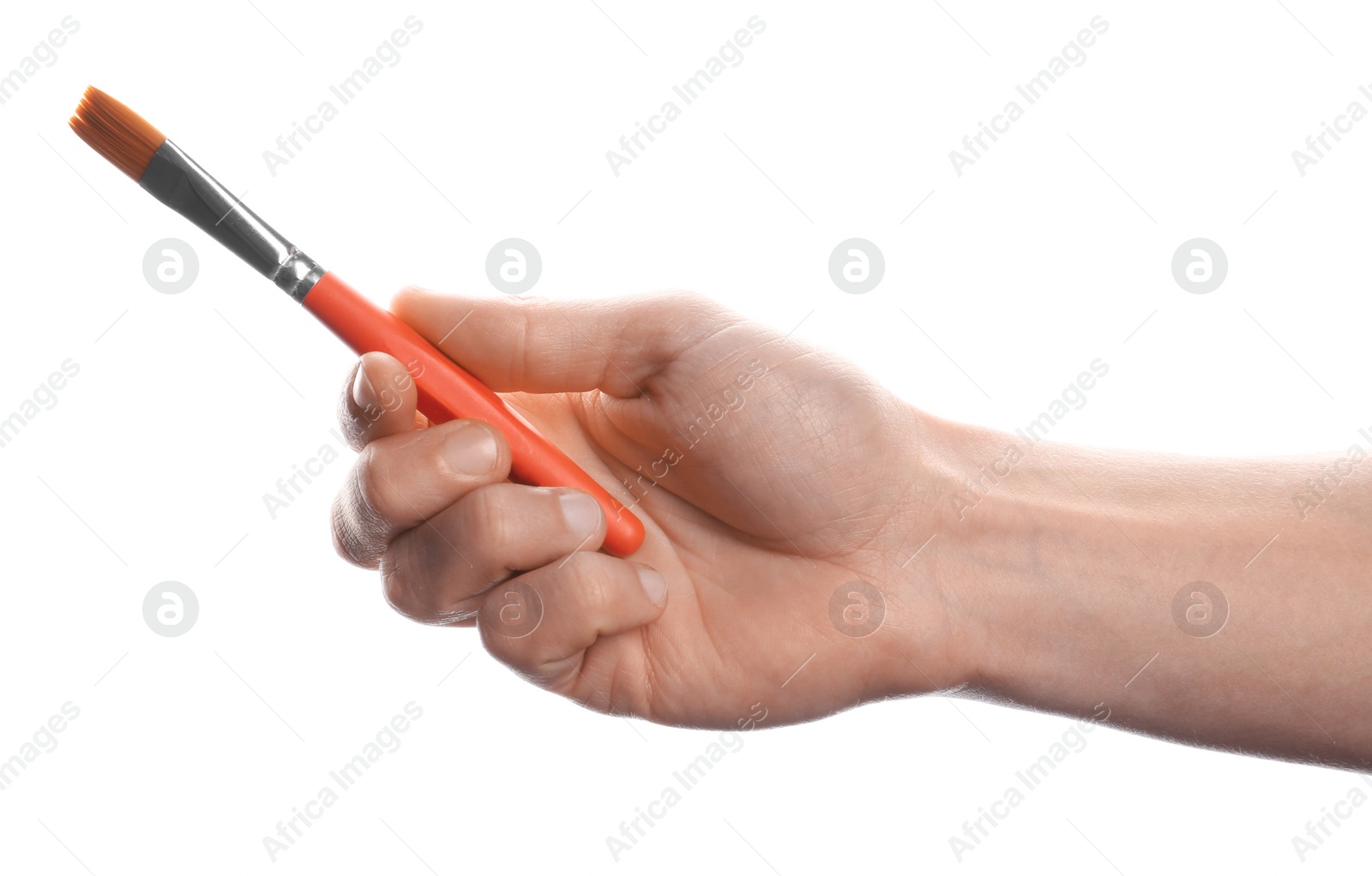 Photo of Man holding paint brush on white background, closeup