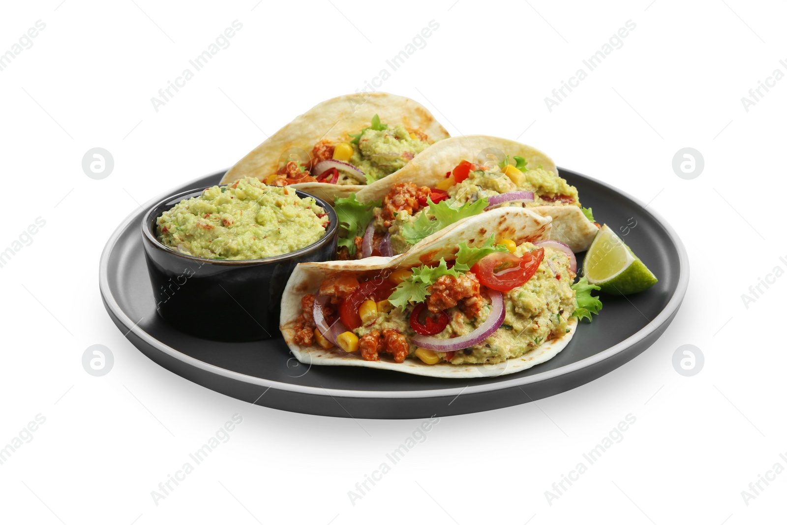 Photo of Delicious tacos with guacamole, meat, vegetables and slice of lime isolated on white