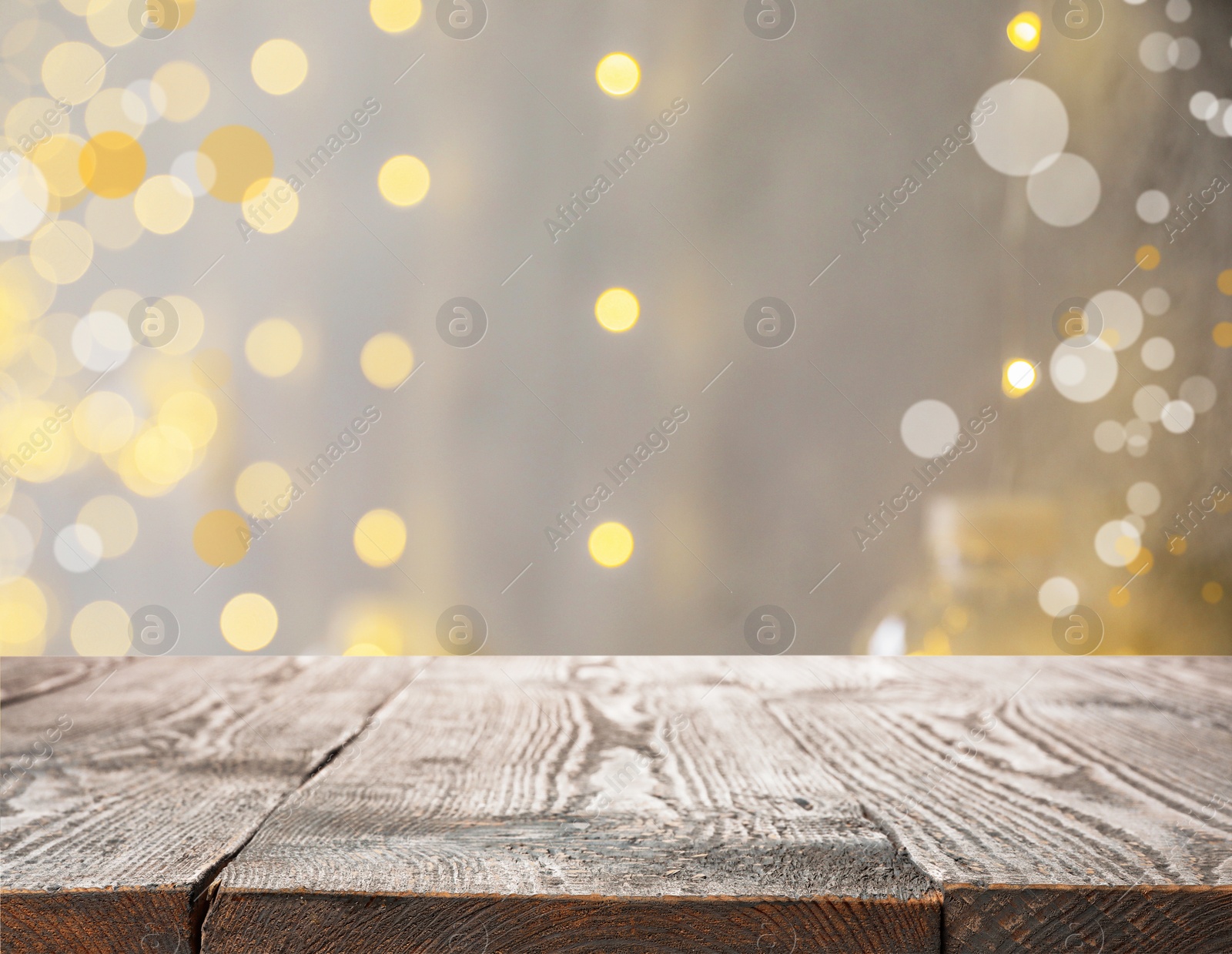 Image of Empty wooden surface against blurred background with bokeh effect. Christmas time