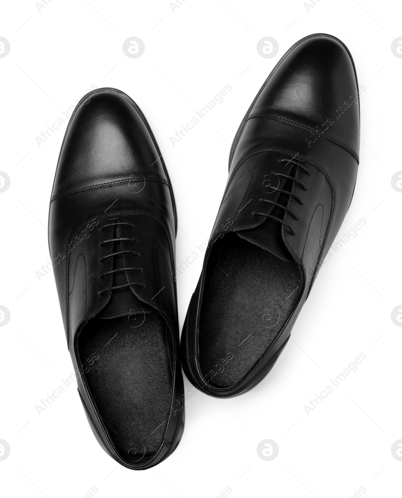 Photo of Pair of black leather men shoes on white background, top view