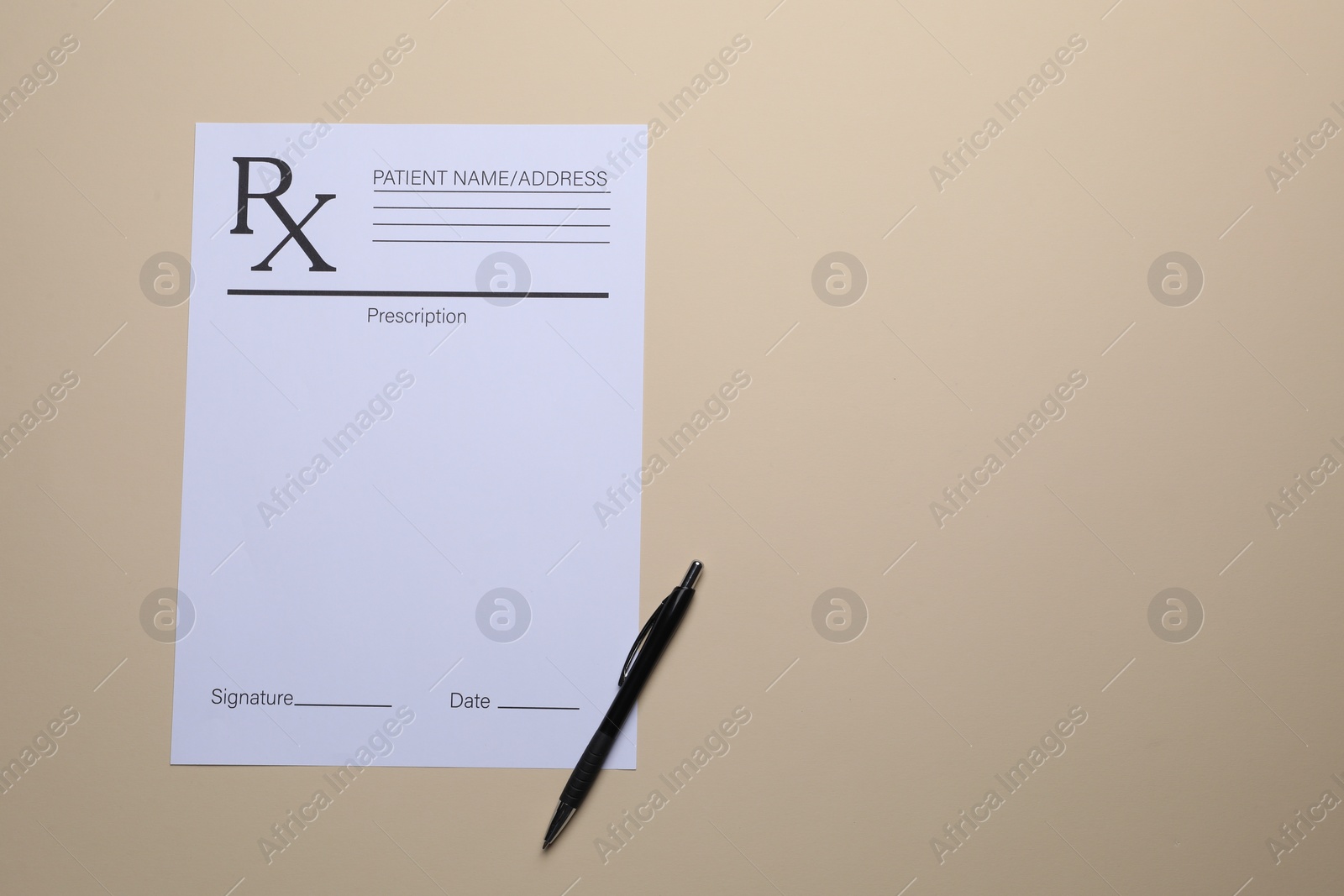 Photo of Medical prescription form and pen on beige background, top view. Space for text