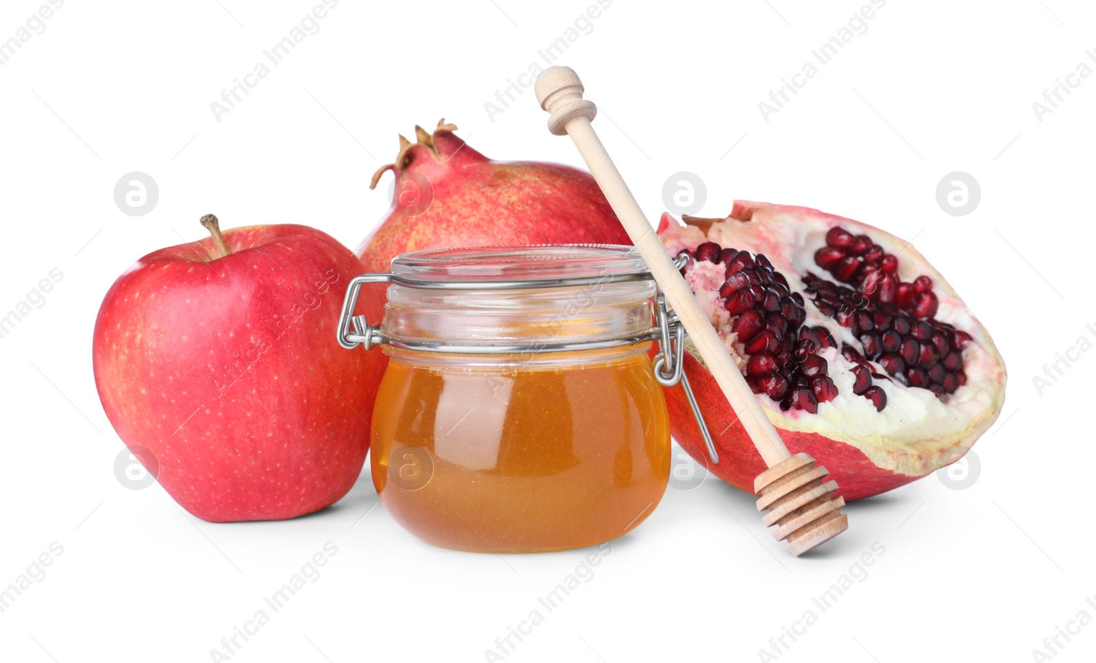 Photo of Honey, apple and pomegranates on white background. Rosh Hashanah holiday