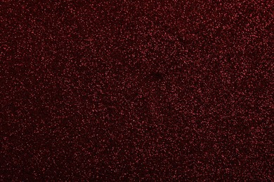 Beautiful shiny burgundy glitter as background, closeup