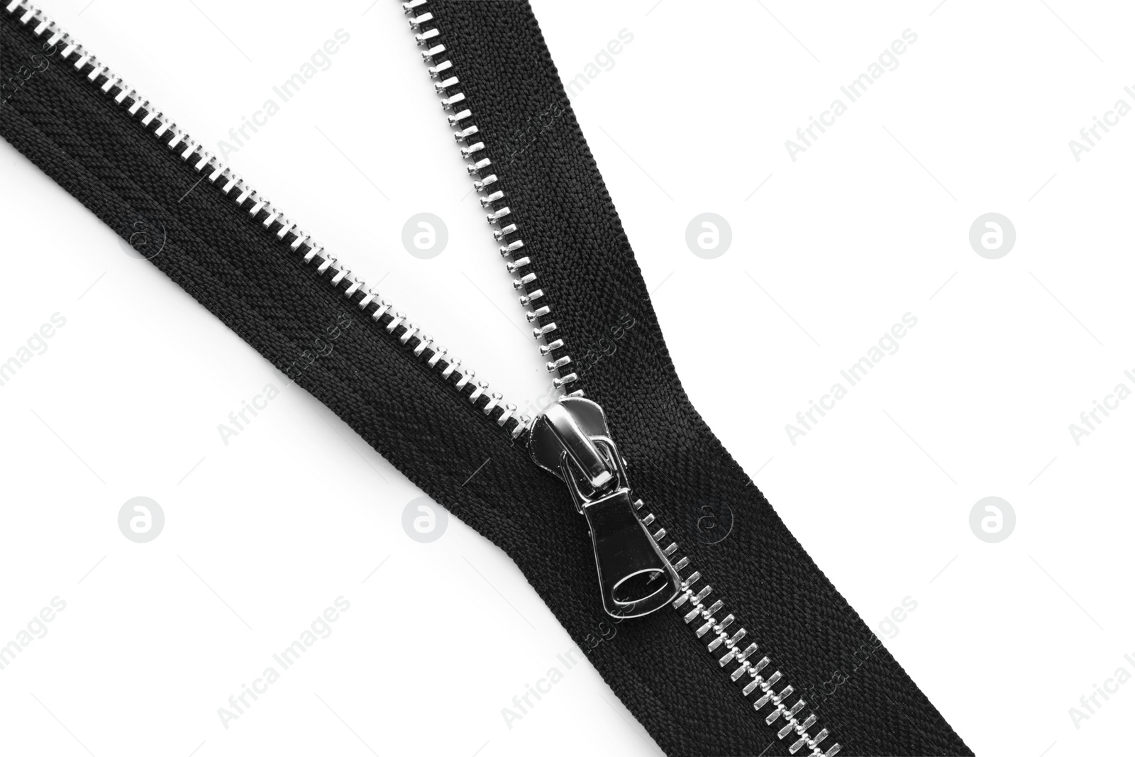 Photo of Black zipper on white background, top view