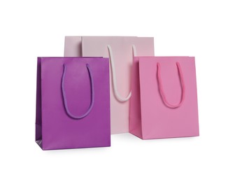 Colorful paper shopping bags isolated on white