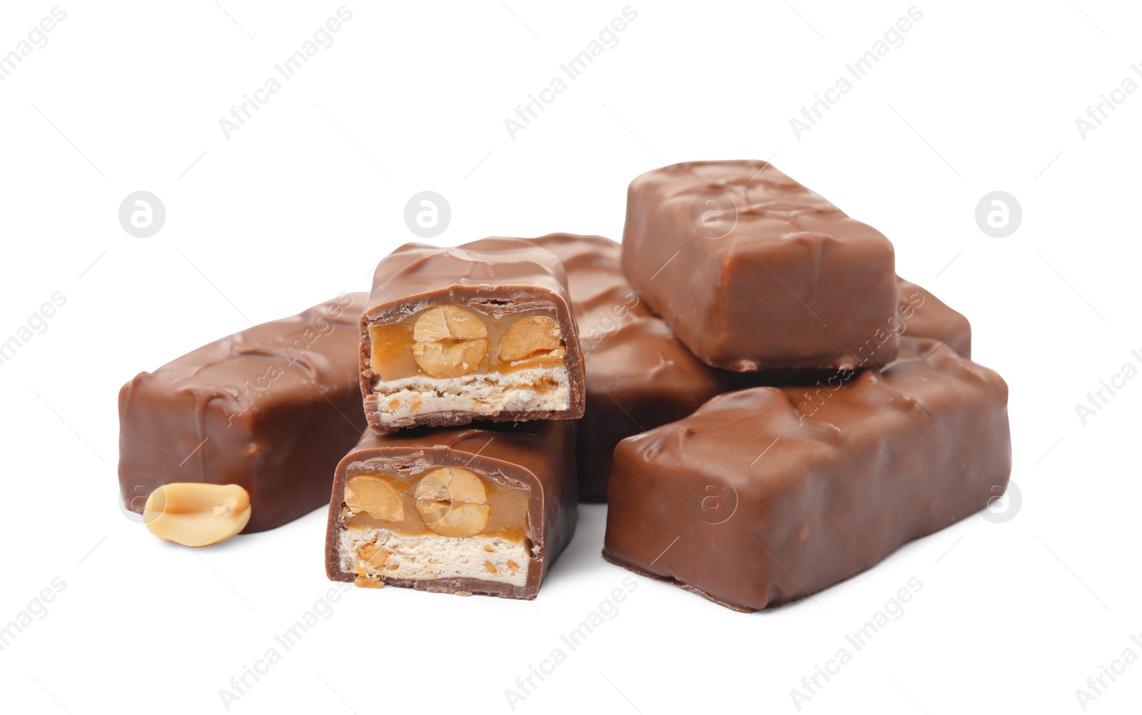 Photo of Chocolate bars with caramel, nuts and nougat isolated on white