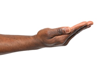 African-American man holding something in hand on white background, closeup