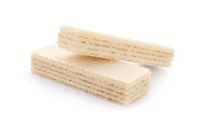 Photo of Delicious crispy wafers on white background. Sweet food