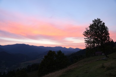 Photo of Picturesque view of mountain landscape at sunset