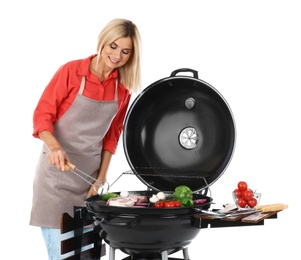 Photo of Woman in apron cooking on barbecue grill, white background