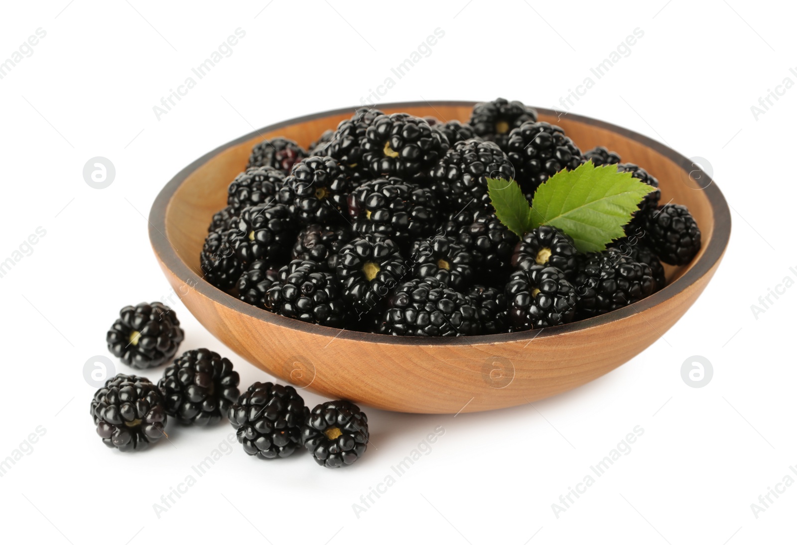 Photo of Bowl and fresh ripe blackberries on white background