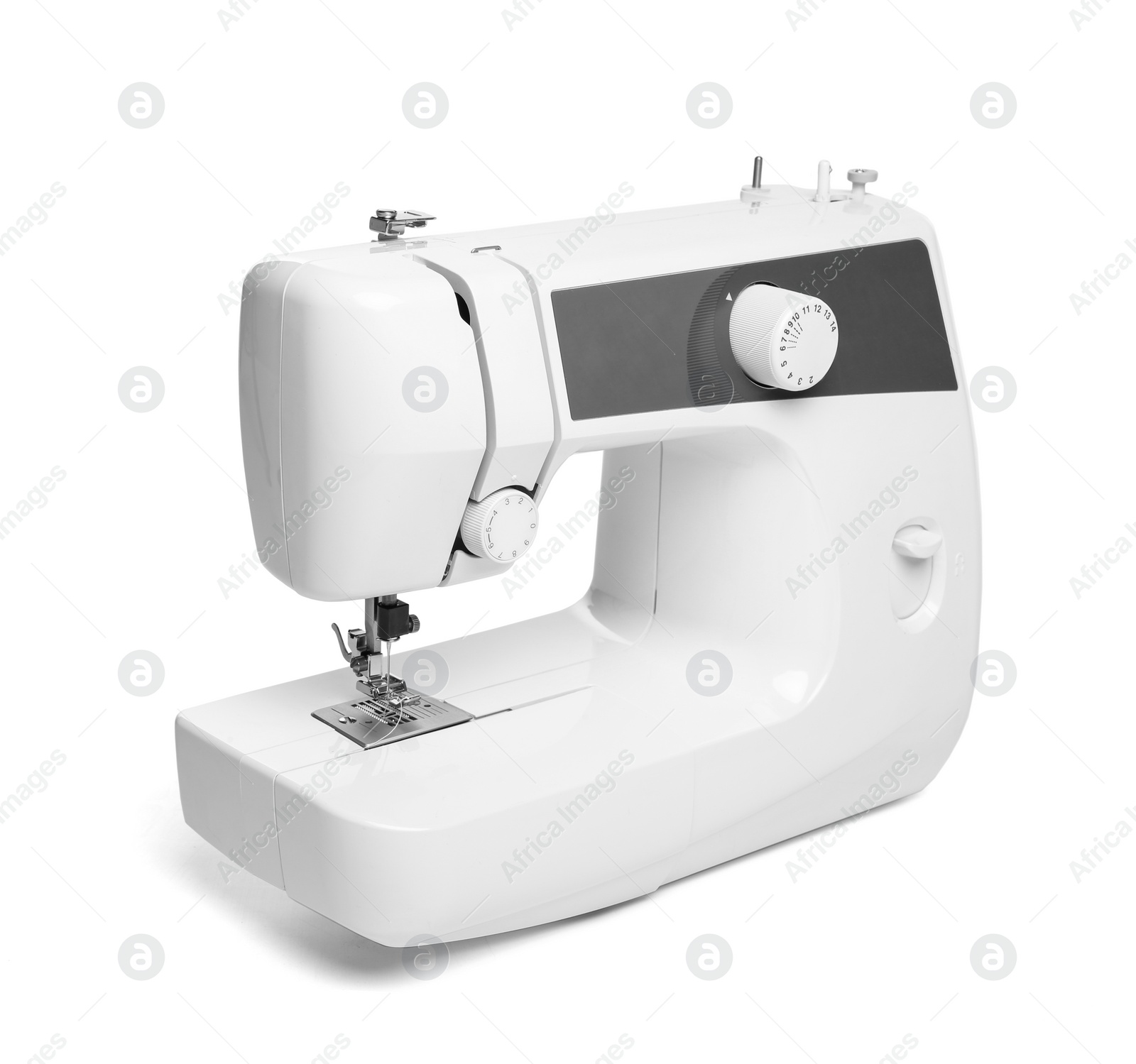 Photo of Sewing machine on white background