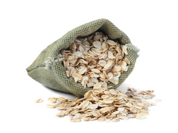 Photo of Raw oatmeal and sack bag on white background